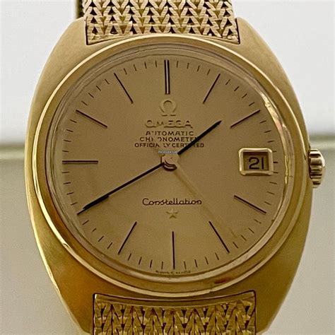 omega yellow gold watch